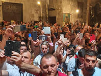 В храме Гроба Господня в Иерусалиме прошла церемония освящения Благодатного огня В храме Гроба Господня в Иерусалиме прошла церемония освящения Благодатного огня