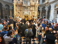 В храме Гроба Господня в Иерусалиме прошла церемония освящения Благодатного огня В храме Гроба Господня в Иерусалиме прошла церемония освящения Благодатного огня