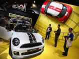 MINI Coupe и MINI Roadster на автосалоне Auto China, апрель 2012 года MINI Coupe и MINI Roadster на автосалоне Auto China, апрель 2012 года