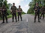 Несмотря на объявленное Киевом прекращение огня, бои на востоке Украины продолжаются Несмотря на объявленное Киевом прекращение огня, бои на востоке Украины продолжаются