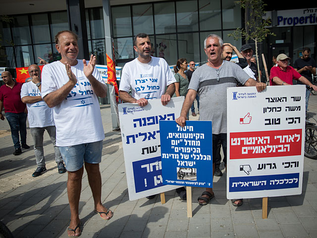 Бесплатная раздача одежды в Тель-Авиве: акция протеста производителей