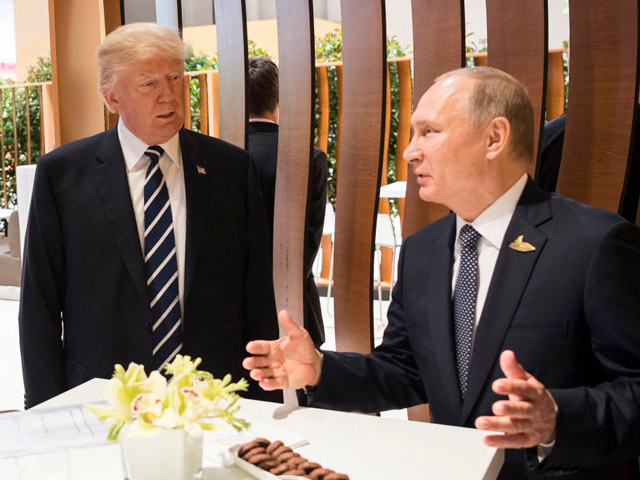 Дональд Трамп и Владимир Путин. Гамбург, 6 июля 2017 года   