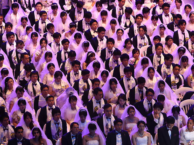 Массовая свадьба Церкви объединения: торжество на 4 тысячи пар