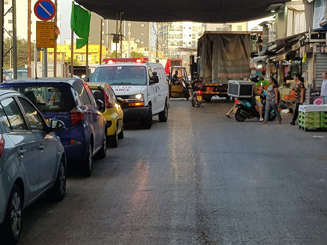 На месте пожара на рынке Кармель в Тель-Авиве. 22 октября 2018 года