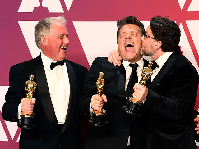 Пол Месси, Тим Кавагин и Джон Казали  на вручении "Оскара". 24 февраля 2019 года
