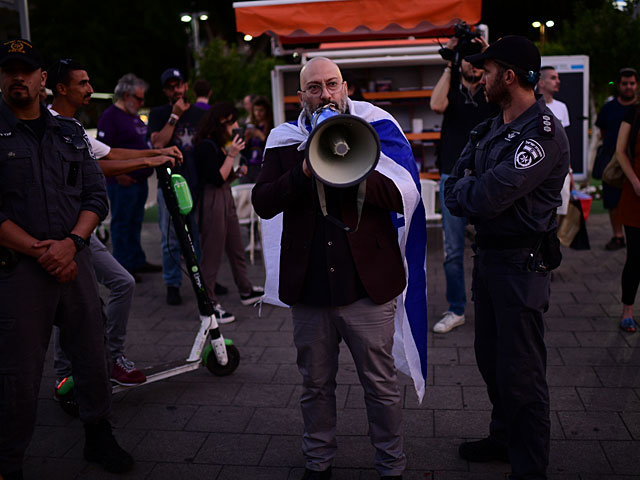 В Тель-Авиве проходит акция протеста, участники которой требуют снять блокаду с Газы