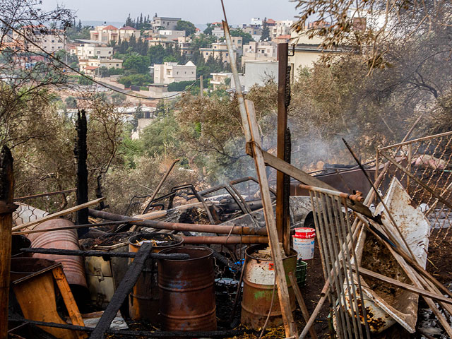 Последствия пожаров в день летнего хамсина в Израиле