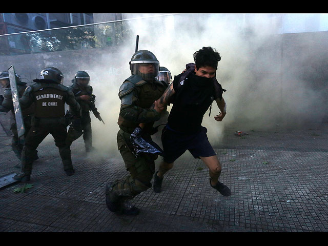 Беспорядки в Чили: протест, переросший в погромы