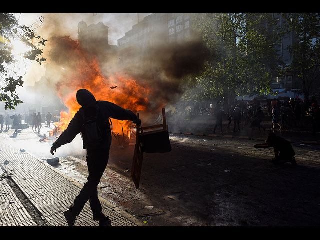 Беспорядки в Чили: протест, переросший в погромы