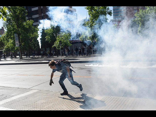 Массовые протесты в Чили: три недели хаоса. Фоторепортаж