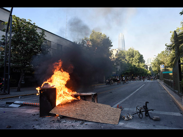 Массовые протесты в Чили: три недели хаоса. Фоторепортаж