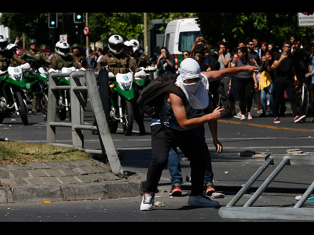 Массовые протесты в Чили: три недели хаоса. Фоторепортаж