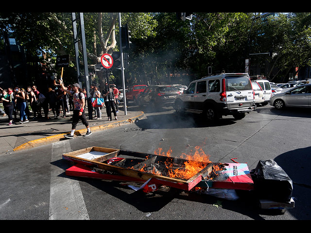 Массовые протесты в Чили: три недели хаоса. Фоторепортаж