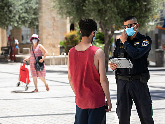 Полиция Израиля изменила тактику в отношении молодых людей,не носящих маски