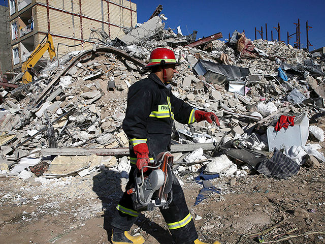 High-rise building collapses in Iran, dozens missing
