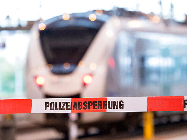 Knife-wielding gunman kills two passengers and injures five on train in northern Germany