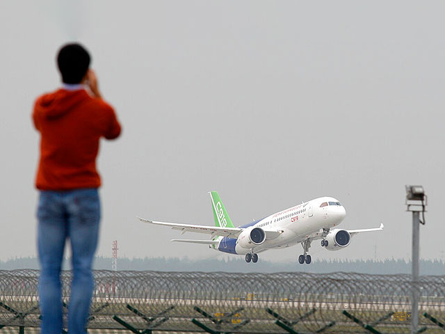 China-designed passenger plane takes off for first flight from Shanghai
