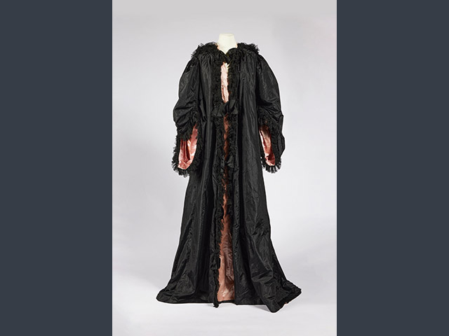 Opera cloak worn by Lady Sassoon, c.1895. Silk satin and taffeta with lace; 153 x 75 x 90 cm