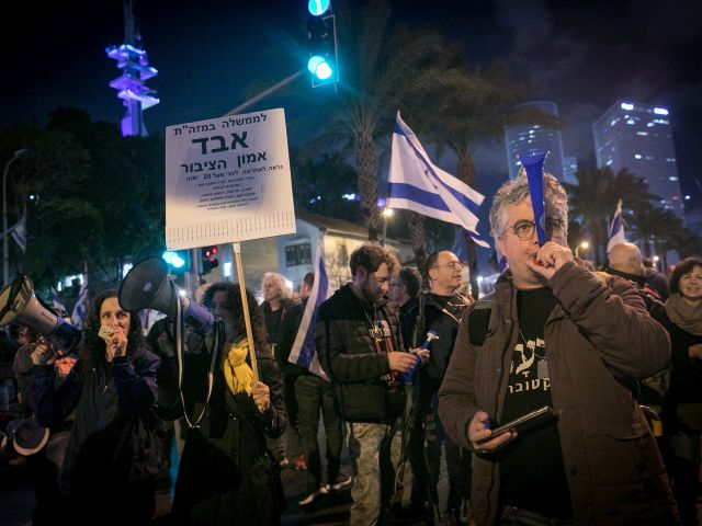 Акции протеста в Израиле: против Нетаниягу, за освобождение заложников. Фоторепортаж