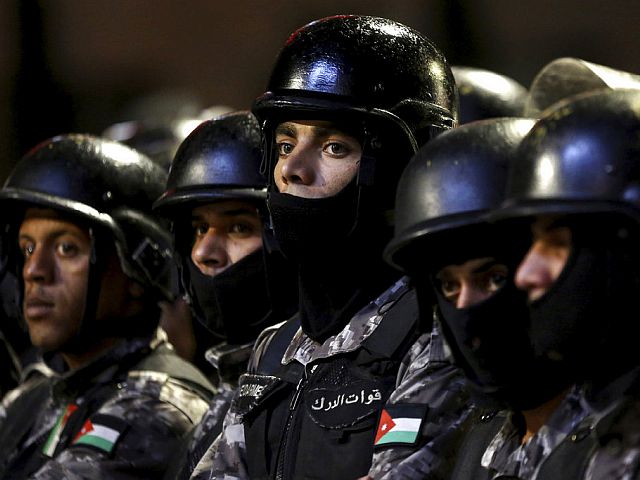 Police in Jordan push protesters away from Israeli embassy during anti-Israel march