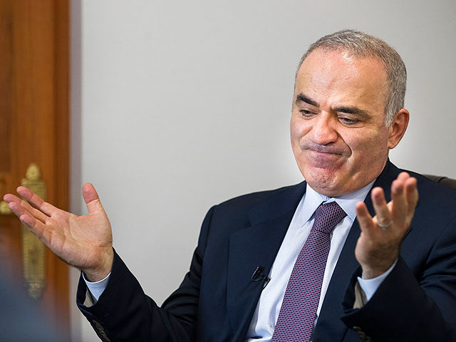 World chess champion Garry Kasparov was arrested in absentia in Russia