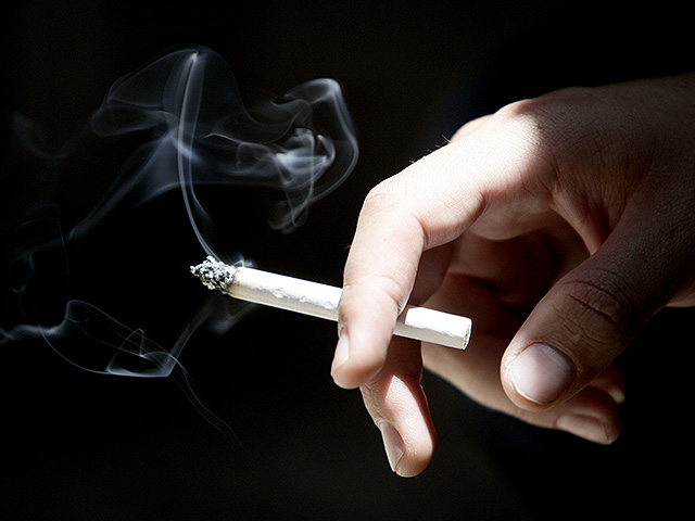 Raising the stakes: Scientists now claim that smoking a cigarette takes about 20 minutes off your life.