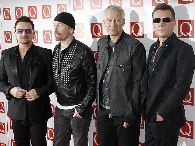 Участники группы U2 (слева направо): Боно, Эдж, Адам Клейтон и Ларри Маллен. 2011 год