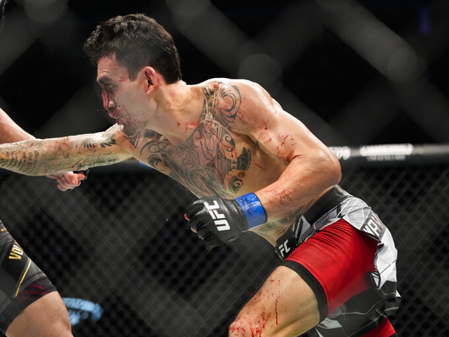 UFC. Холлоуэй завершил победой трилогию с Порье