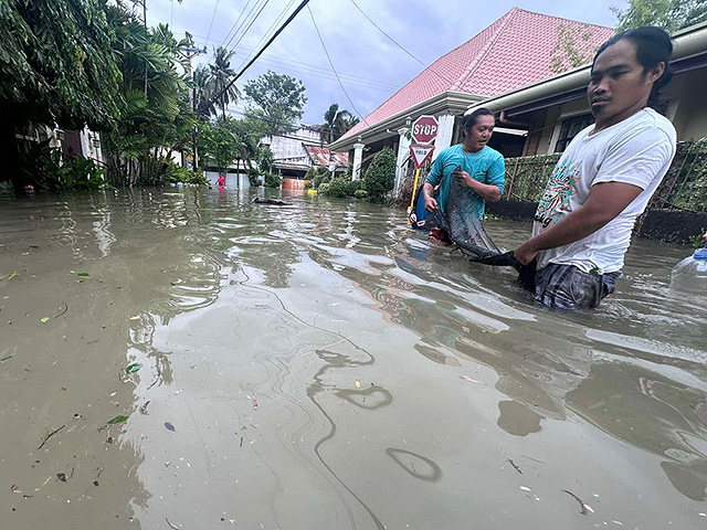 Последствия тайфуна "Калмаэги" на Филиппинах. Фоторепортаж
