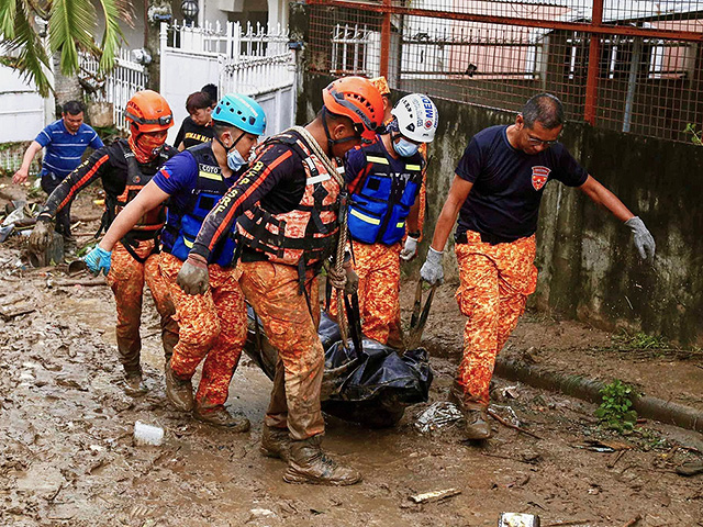 Последствия тайфуна "Калмаэги" на Филиппинах. Фоторепортаж