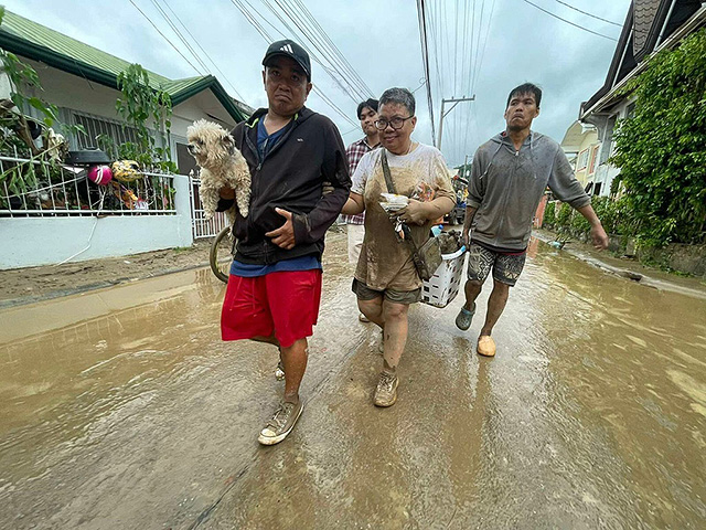 Последствия тайфуна "Калмаэги" на Филиппинах. Фоторепортаж
