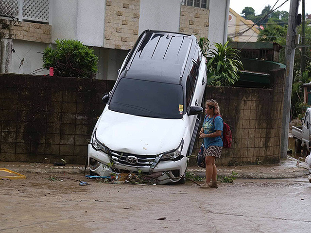 Последствия тайфуна "Калмаэги" на Филиппинах. Фоторепортаж
