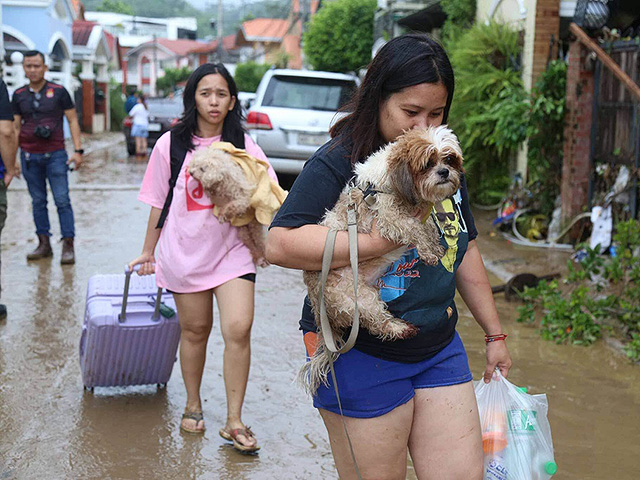 Последствия тайфуна "Калмаэги" на Филиппинах. Фоторепортаж