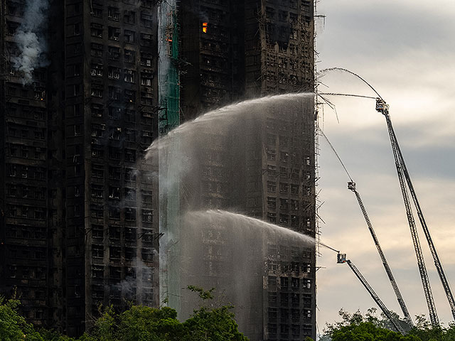 Пожар в высотном комплексе в Гонконге: множество жертв. Фоторепортаж