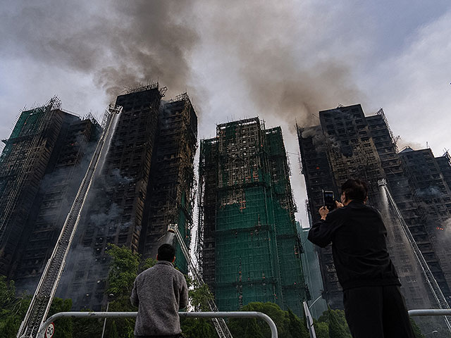 Пожар в высотном комплексе в Гонконге: множество жертв. Фоторепортаж