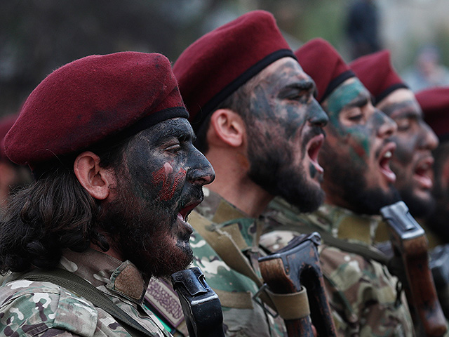 Сирия празднует первую годовщину свержения Башара Асада. Фоторепортаж