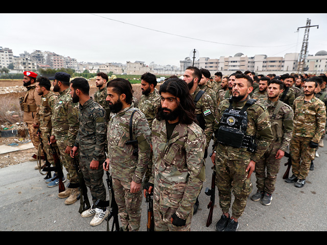 Сирия празднует первую годовщину свержения Башара Асада. Фоторепортаж