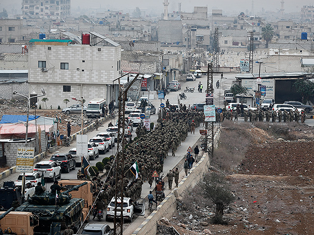 Сирия празднует первую годовщину свержения Башара Асада. Фоторепортаж