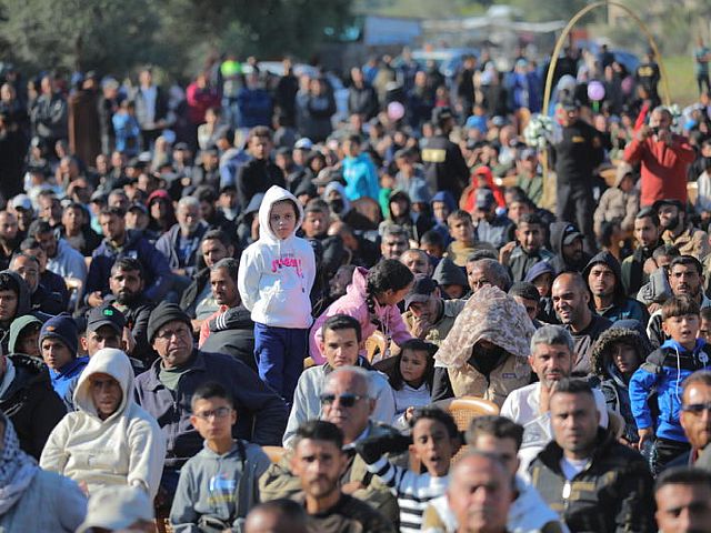 Под флагами Турции и ООП: в Газе поженились более 200 пар. Фоторепортаж