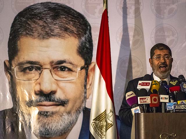 Мухаммад Мурси набрал 51,7% голосов, его соперник Ахмад Шафик - 48,3%