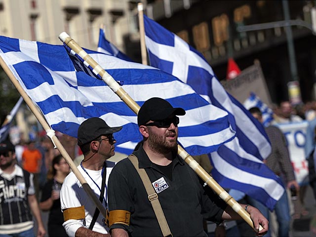 Беспорядки в Афинах в канун голосования по пакету сокращений 
