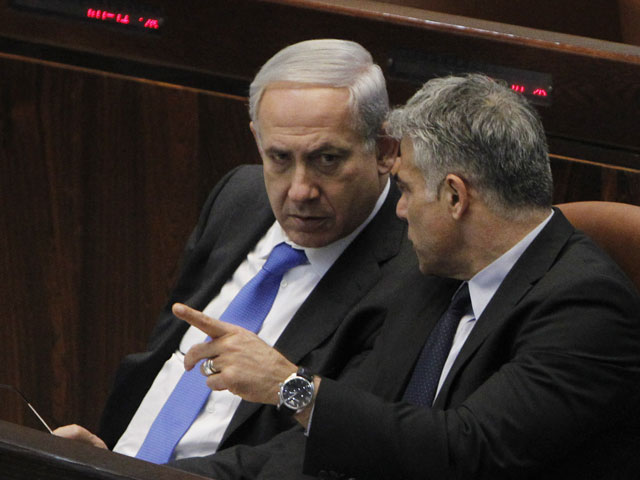 Глава правительства Израиля Биньямин Нетаниягу и министр финансов Яир Лапид