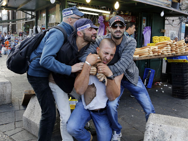 Задержание одного из участников нападения. Иерусалим, 24 сентября 2013 года
