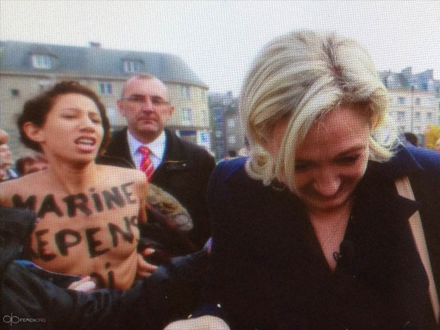 Активистка FEMEN и Марин Ле Пен. Фужер, 26 октября 2013 года