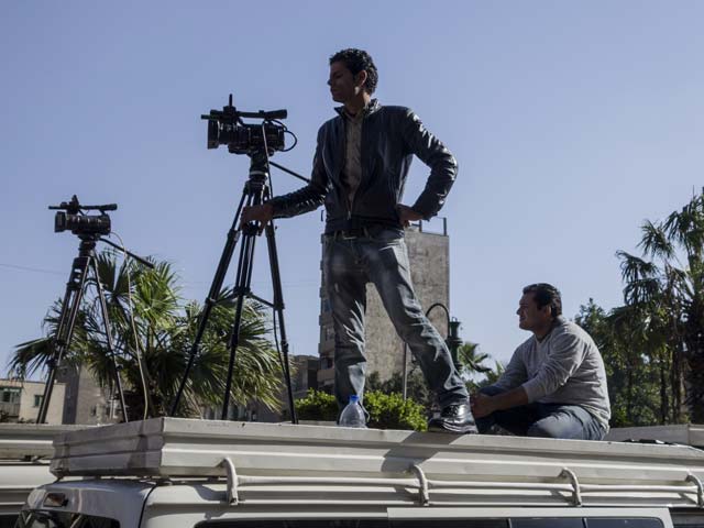 Работа тележурналистов в Египте