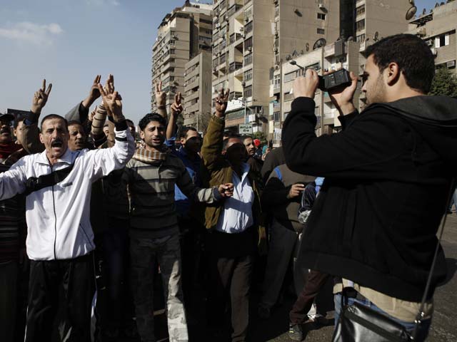 Работа тележурналистов в Египте