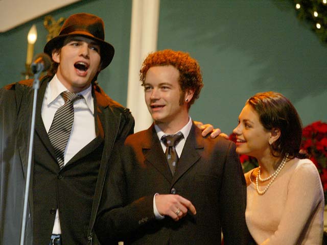 Эштон Кутчер, Дэни Мастерсон и Мила Кунис в 2003 году