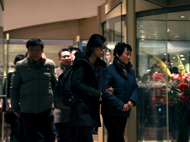 Родственники пассажиров пропавшего самолета. Пекин, 9 марта 2014 года
