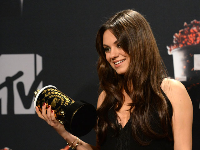 Мила Кунис на церемонии вручения наград MTV Movie Awards 13 апреля 2014 г.