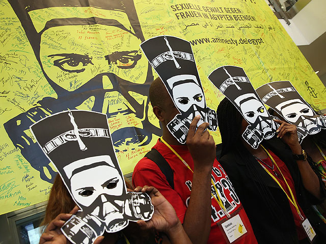 Акция активистов Amnesty International против сексуальных преступлений в Египте